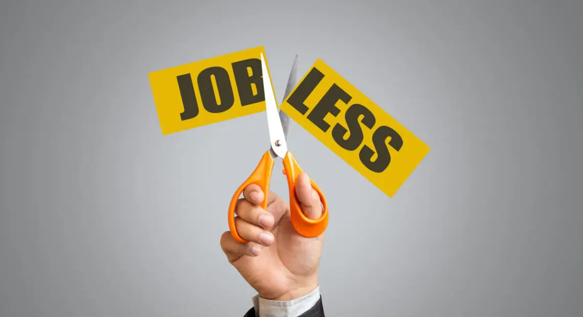 Job losses and vacant posts in AYUSH and homeopathy institutions highlighted by scissors cutting ‘Job Less’ sign